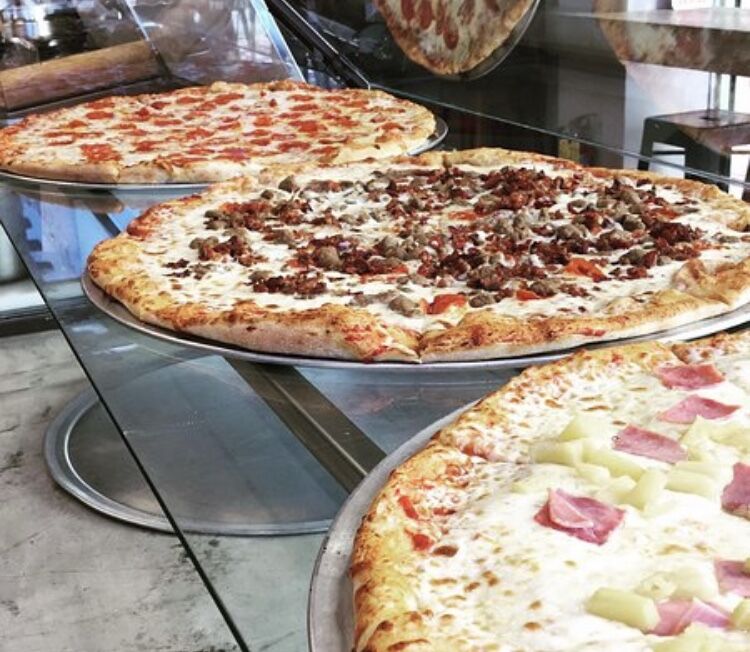 Pommodori Pizza pies.jpg